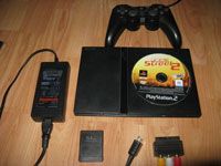 PS2 slim eredeti játékkal extrával