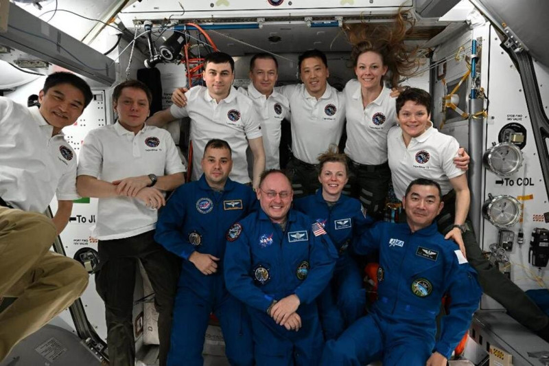 Expedition 73 welcomes NASA's SpaceX Crew-11 mission aboard the International Space Station. In the front from left are, Crew-11 members Oleg Platonov, Mike Fincke, Zena Cardman, and Kimiya Yui. In the back are, Expedition 73 members Takuya Onishi, Kirill Peskov, Alexey Zubritsky, Sergey Ryzhikov, Jonny Kim, Nichole Ayers, and Anne McClain.